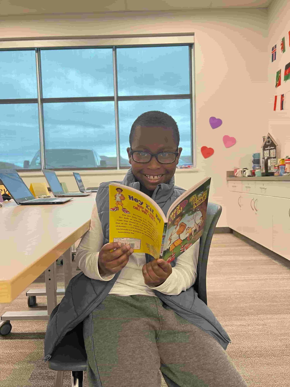 Image of child with book
