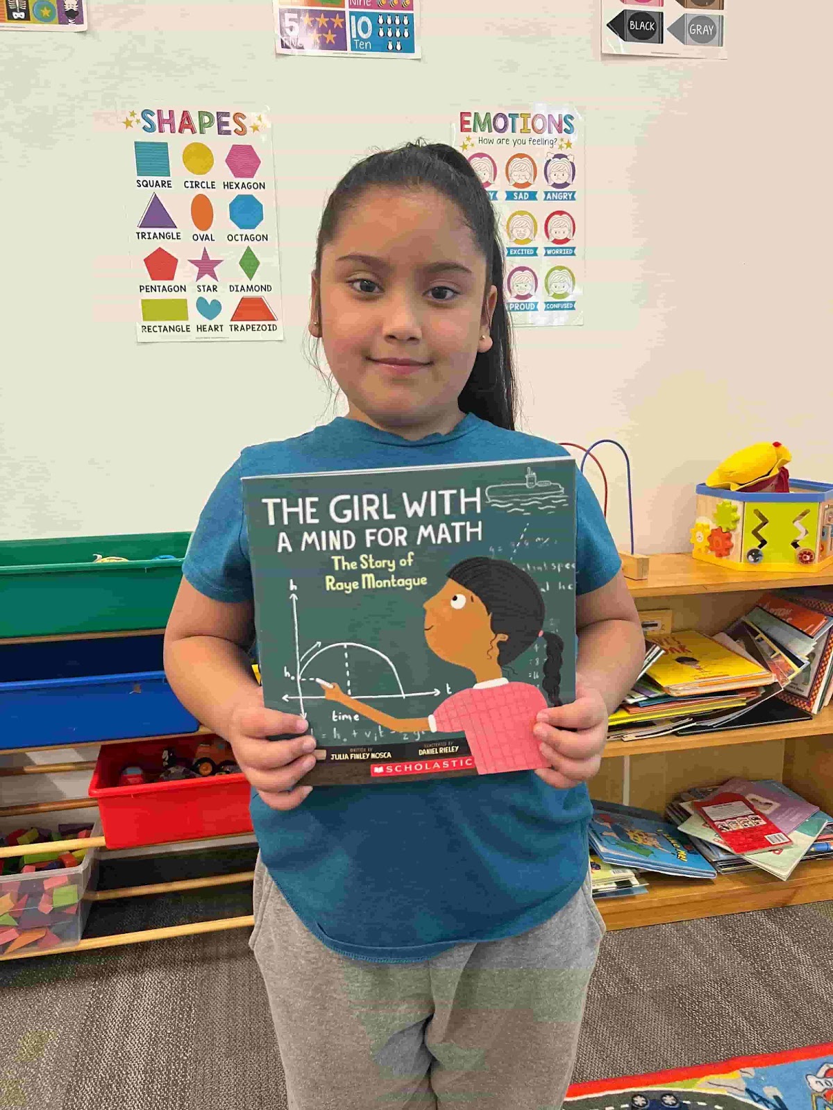 Image of child with book